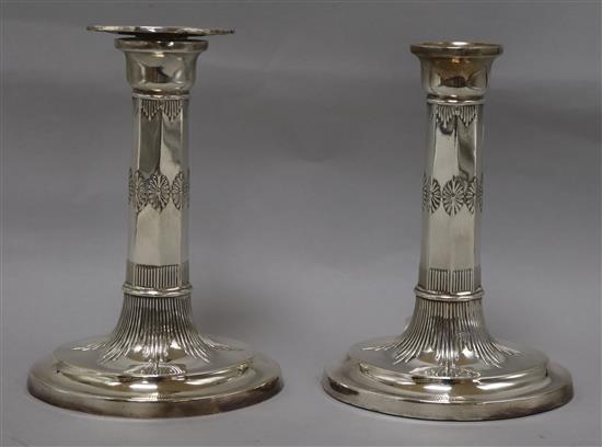 A pair of George III style plated candlesticks height 16cm